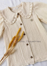 Blusa plumeti blanco rota Familia Emily de Boetie