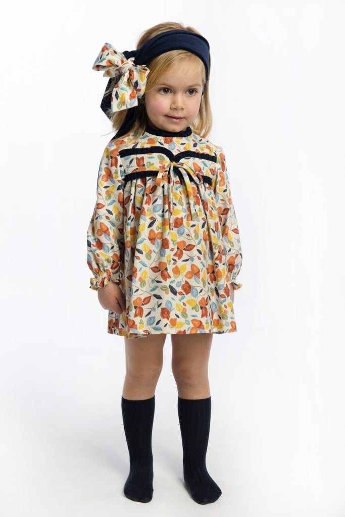 Vestido bebe niña floral con detalles en azul marino de Cocote