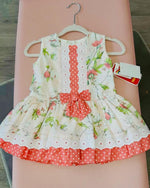 Vestido bebe niña flores coral de Pizpireta